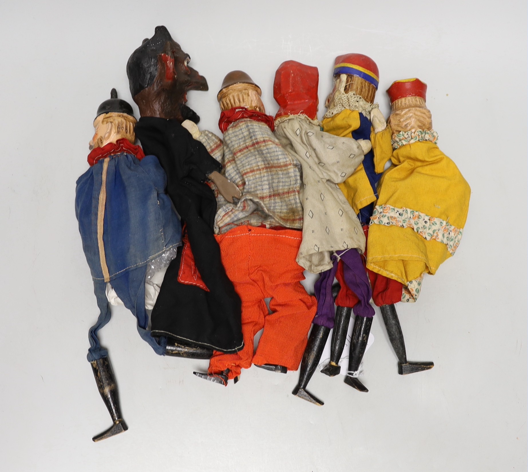 Six various early 20th century wooden Punch character puppets
